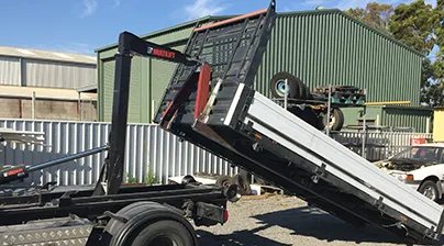 Image of a construction vehicle unloading stuff